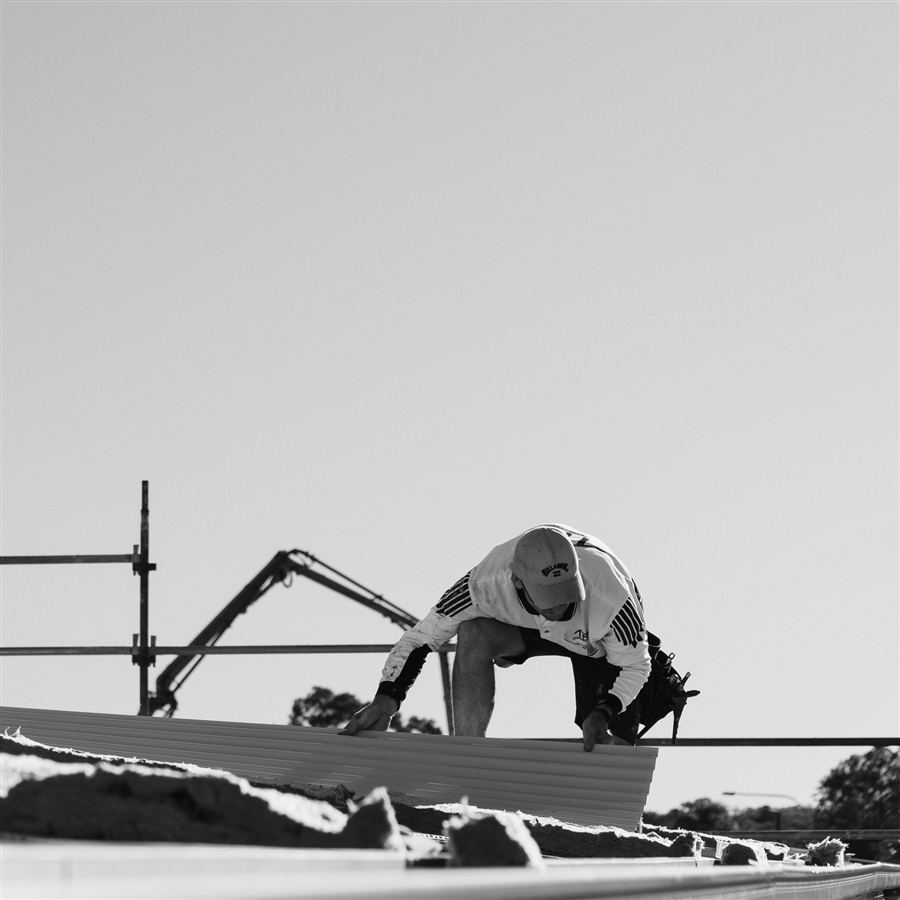 Excavator and scaffolding on a building site